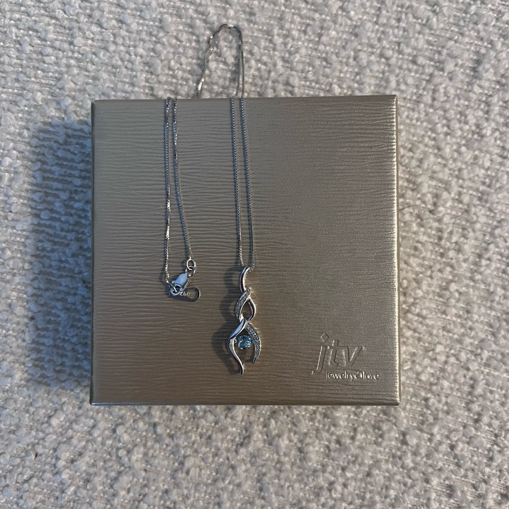 Swiss Blue Topaz Rhodium Over Sterling Silver Pendant 0.33ctw